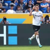 Patrik Schick of Bayer 04 Leverkusen celebrates after scoring their team's first goal during the Bundesliga match between TSG Hoffenheim and Bayer 04 Leverkusen at PreZero-Arena on May 07, 2022 in Sinsheim, Germany. (Photo by Alex Grimm/Getty Images)