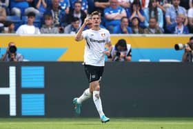 Patrik Schick of Bayer 04 Leverkusen celebrates after scoring their team's first goal during the Bundesliga match between TSG Hoffenheim and Bayer 04 Leverkusen at PreZero-Arena on May 07, 2022 in Sinsheim, Germany. (Photo by Alex Grimm/Getty Images)