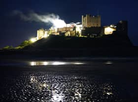 Smoke billows from Bamburgh Castle in Northumberland as filming for the new Indiana Jones 5 movie starring Harrison Ford takes place during the night. Picture date: Thursday June 10, 2021.