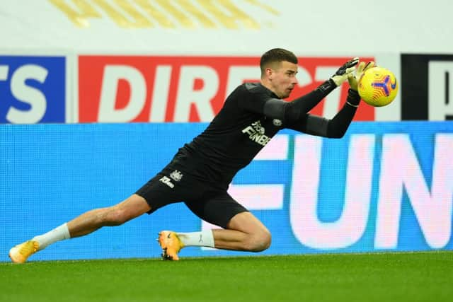 NEWCASTLE UPON TYNE, ENGLAND - DECEMBER 30: Karl Darlow of Newcastle United warms up prior to the Premier League match between Newcastle United and Liverpool at St. James' Park on December 30, 2020 in Newcastle upon Tyne, England. The match will be played without fans, behind closed doors as a Covid-19 precaution. (Photo by Stu Forster/Getty Images)