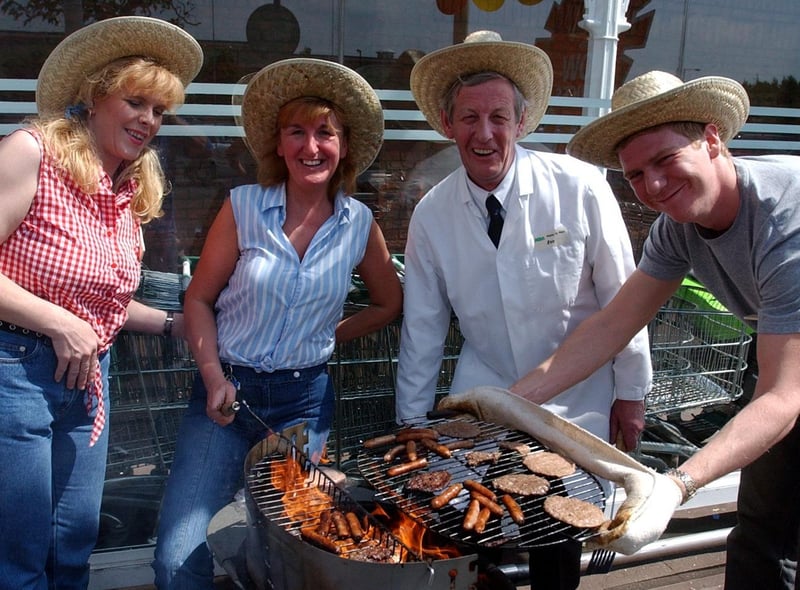 Who do you recognise in this barbecue photo in aid of St Clare's Hospice in 2003?