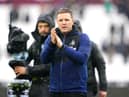 Newcastle United head coach Eddie Howe applauds fans at the London Stadium.