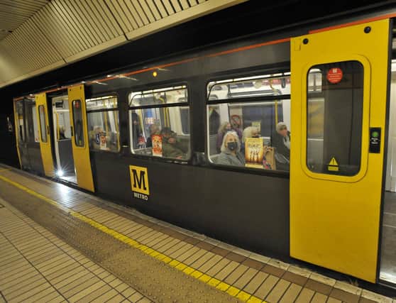 Commuters wearing face masks at Monument station on the Tyne and Wear Metro as face coverings once again became compulsory on public transport in England in attempt to control the spread of Covid.