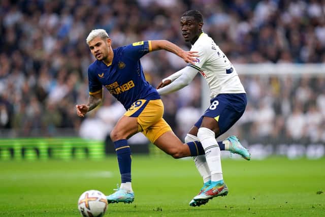 Newcastle United's Bruno Guimaraes and Tottenham Hotspur's Yves Bissouma battle for the ball.