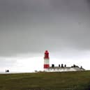 A woman has been taken to hospital after being found by coastguard teams near to Souter Lighthouse.
