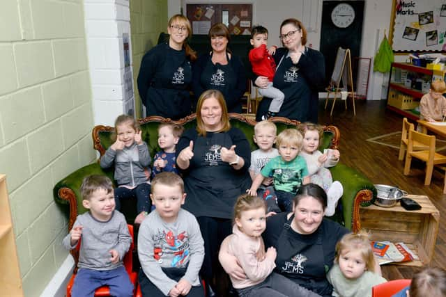 Staff and children at Little Jems Nursery celebrating their good Ofsted report.