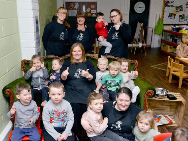 Staff and children at Little Jems Nursery celebrating their good Ofsted report.