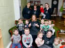 Staff and children at Little Jems Nursery celebrating their good Ofsted report.