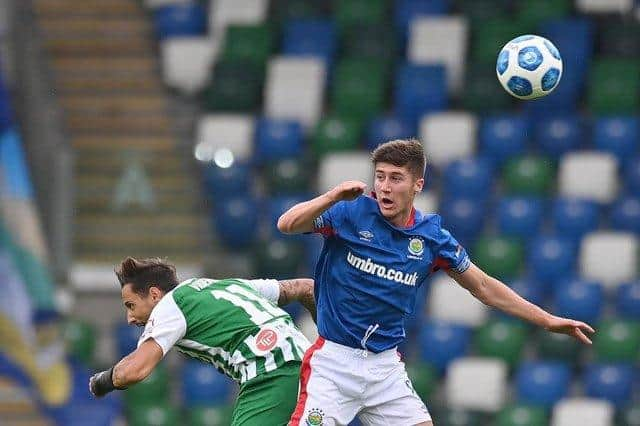 New Sunderland signing Trai Hume playing for Linfield FC.