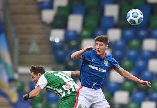 New Sunderland signing Trai Hume playing for Linfield FC.
