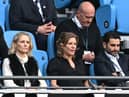 Newcastle United's English minority owner Amanda Staveley (C) and her husband Mehrdad Ghodoussi react during the English Premier League football match between Manchester City and Newcastle United at the Etihad Stadium in Manchester, north west England, on May 8, 2022. (Photo by PAUL ELLIS/AFP via Getty Images)