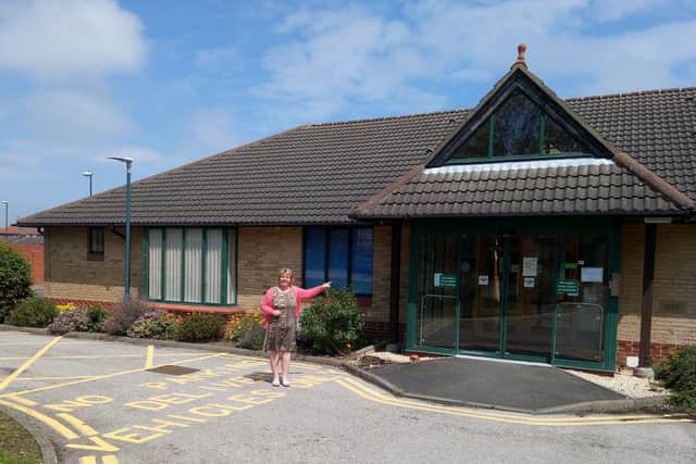 Kay Smith outside the former St Clare's Hospice building in Jarrow.