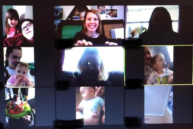 Mums keep in touch via Zoom calls while face to face classes are cancelled.