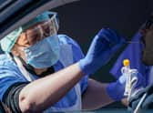 National Health Service (NHS) workers are tested for Coronavirus (Covid-19) at a drive-through testing site (Photo by Christopher Furlong/Getty Images)