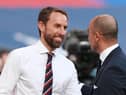 England's manager Gareth Southgate (L) greets Belgium's coach Roberto Martinez before the UEFA Nations League group A2 football match between England and Belgium at Wembley stadium in north London on October 11, 2020. (Photo by Ian Walton / POOL / AFP) / NOT FOR MARKETING OR ADVERTISING USE / RESTRICTED TO EDITORIAL USE (Photo by IAN WALTON/POOL/AFP via Getty Images)