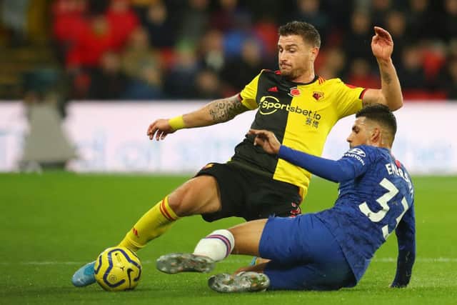 WATFORD, ENGLAND - NOVEMBER 02: Daryl Janmaat of Watford is challenged by Emerson Palmieri of Chelsea during the Premier League match between Watford FC and Chelsea FC at Vicarage Road on November 02, 2019 in Watford, United Kingdom. (Photo by Catherine Ivill/Getty Images)