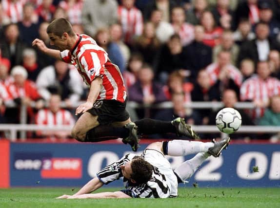 21 Apr 2001:  Kevin Phillips of Sunderland is tackled by Andy O'Brien of Newcastle during the Sunderland v Newcastle United FA Carling Premiership match at the Stadium of Light, Sunderland. Mandatory Credit: Stu Forster/ALLSPORT