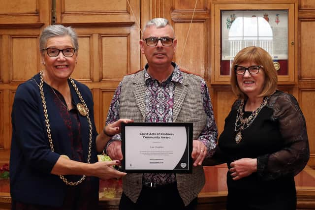 The Mayor of South Tyneside, Councillor Pat Hay presents Lee Hughes with his Covid Act of Kindness Community Award at South Shields Town Hall. The Mayoress, Jean Copp is also pictured.