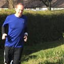 Neil Parker ran a whole marathon without leaving his garden