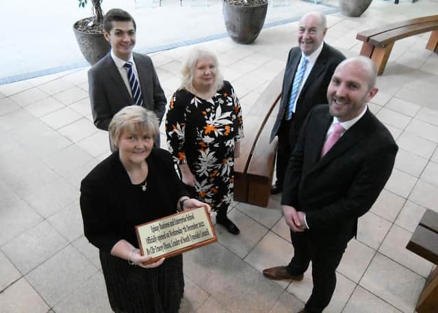Councillor Tracey Dixon, leader of South Tyneside Council holds the opening plaque as (left to right) Adam Ellison (cabinet member for children, young people and families South Tyneside Council) Audrey Whitelaw (chair of governors) Robert Whitelaw (vice Chair of  governors) and Chris Rue Headteacher. Photographed after the official opening of the Epinay Business and Enterprise School, South Shields. Picture by FRANK REID