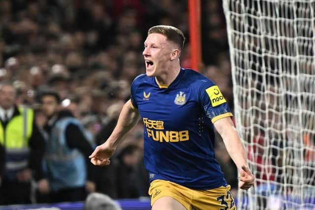 Newcastle United's English midfielder Elliot Anderson celebrates after scoring Newcastle's second goal but it is disallowed soon after during the English Premier League football match between Nottingham Forest and Newcastle United at The City Ground in Nottingham, central England, on March 17, 2023. (Photo by Oli SCARFF / AFP)