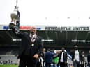Rafa Benitez with the Championship trophy.