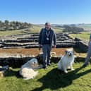 National Trust Volunteers and Dog Rangers, Tom Millmore and Mr Darcy and Charlie Wainwright and Bear at Housesteads Roman Fort in Northumberland