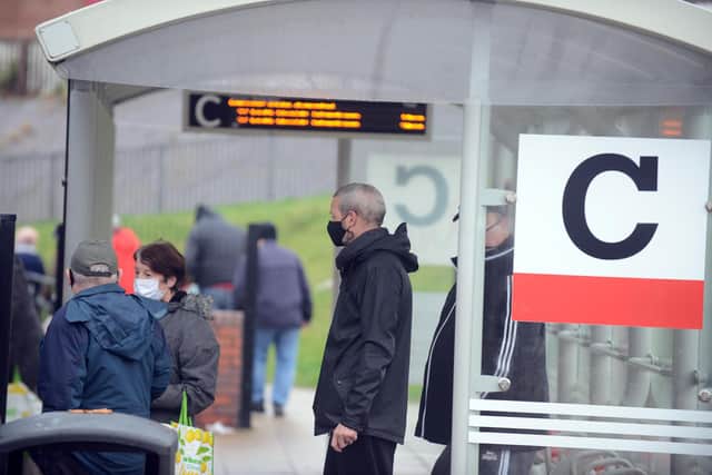 Passengers in masks at Jarrow bus station.
