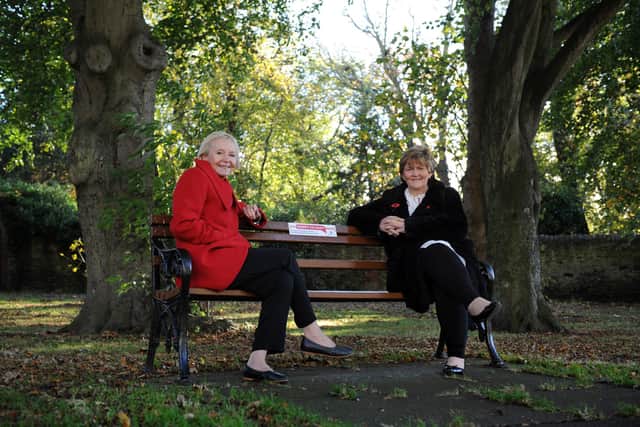 Coun Anne Hetherington (left) and CounTracey Dixon with one of the new Happy to Chat benches in Whitburn Village