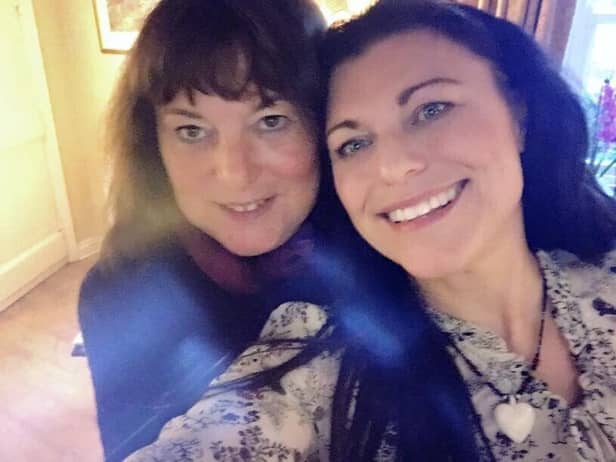 Michele (right) pictured with her sister Annette who asked her to share her experience to encourage others to be socially distant.