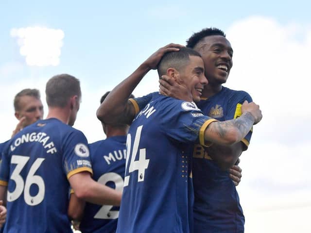 Miguel Almiron of Newcastle United celebrates after scoring their sides fourth goal during the Premier League match between Fulham FC and Newcastle United at Craven Cottage on October 01, 2022 in London, England. (Photo by Tom Dulat/Getty Images)