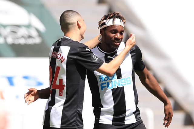 Miguel Almiron, left, celebrates his goal with Allan Saint-Maximin.