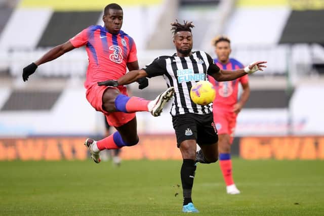 Chelsea's French defender Kurt Zouma (L) vies with Newcastle United's French midfielder Allan Saint-Maximin during the English Premier League football match between Newcastle United and Chelsea at St James' Park in Newcastle-upon-Tyne, north east England on November 21, 2020.