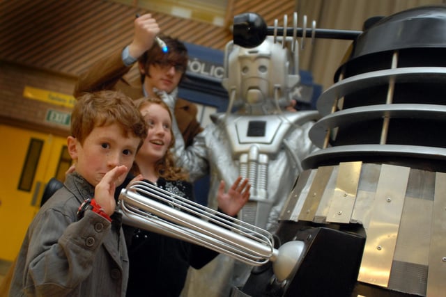 Facing the foe in 2010. Harry Mitchell and his sister Sarah bravely tackle a Dalek.