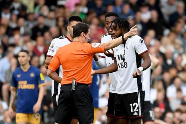 Nathaniel Chalobah of Fulham reacts after being shown a red card by match referee Darren England during the Premier League match between Fulham FC and Newcastle United at Craven Cottage on October 01, 2022 in London, England. (Photo by Tom Dulat/Getty Images)