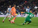 HUDDERSFIELD, ENGLAND - FEBRUARY 12: Jacob Murphy of Cardiff City scores his sides first goal during the Sky Bet Championship match between Huddersfield Town and Cardiff City at John Smith's Stadium on February 12, 2020 in Huddersfield, England. (Photo by George Wood/Getty Images)