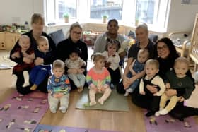 Youngsters and staff at Nurserytime with yoga teacher Vanathi Webster.