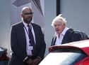 Former Prime Minister Boris Johnson arrives at Gatwick Airport in London, after travelling on a flight from the Caribbean, following the resignation of Liz Truss as Prime Minister. Picture date: Saturday October 22, 2022.