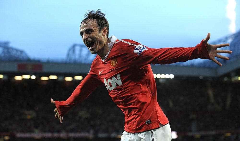 Manchester United forward Dimitar Berbatov celebrates scoring against Newcastle United at Old Trafford in 2010.