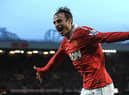 Manchester United forward Dimitar Berbatov celebrates scoring against Newcastle United at Old Trafford in 2010.