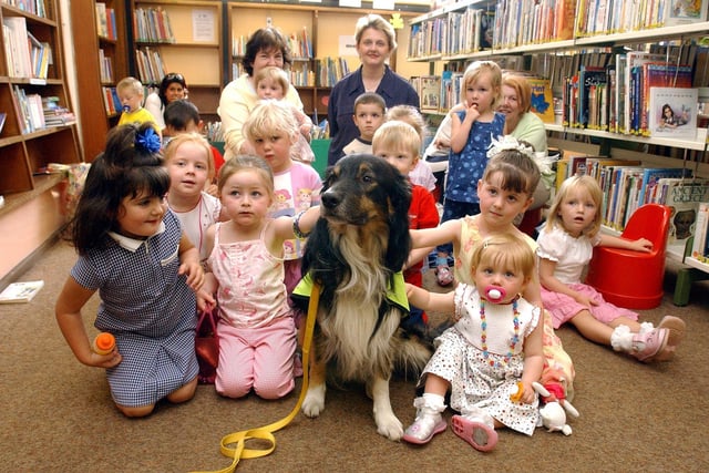 Story time for Sweep the dog and the children at Boldon Lane Library in 2003. Will you be taking part in National Share A Story Month in May?