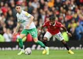 Miguel Almiron of Newcastle United is challenged by Fred of Manchester United during the Premier League match between Manchester United and Newcastle United at Old Trafford on October 16, 2022 in Manchester, England. (Photo by Dan Mullan/Getty Images)