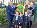 From left: Paul O'Doherty from the Freemasons, with teaching assistant Nicola O'Doherty and executive headteacher Helen Smith, plus pupils from St Oswald's Primary School.