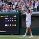 Cameron Norrie of Great Britain celebrates after winning match point against David Goffin of Belgium during their Men's Singles Quarter Final match on day nine of The Championships Wimbledon 2022 at All England Lawn Tennis and Croquet Club on July 05, 2022 in London, England. (Photo by Justin Setterfield/Getty Images)