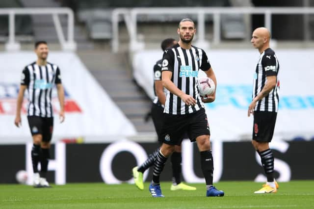 Andy Carroll rejects to a Brighton and Hove Albion goal.