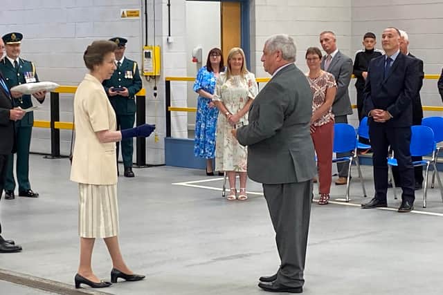 John Barnfather, who worked at South Shields Ambulance Station for 25 years, receiving his Queen's medal from Princess Anne