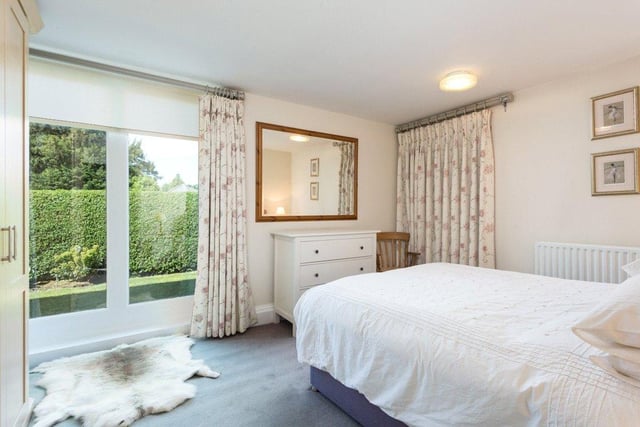 There are four bedrooms throughout the property in total, with the principal bedroom benefiting from its own en-suite bathroom with a spa bath, shower, wash basin and heated towel rail.