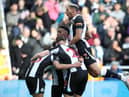 Newcastle United's players celebrate Ryan Fraser's goal.