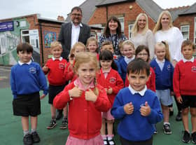 East Boldon Infants' School pupils and staff celebrating their good Ofsted judgement.