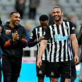 Andy Carroll with team-mates Isaac Hayden and Callum Wilson after Newcastle United's win over Sheffield United.